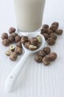 Hazelnut milk and spoon — Stock Photo