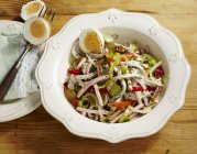 Mixed meat salad in bowl — Stock Photo