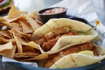 Fish tacos with tortilla chips — Stock Photo