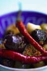 Marinated chillis with olives — Stock Photo