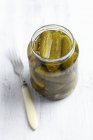 Pickled cucumbers in jar — Stock Photo
