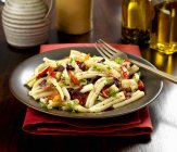 Casarecce gluten free pasta with peppers — Stock Photo