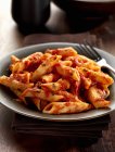 Penne sorentina pasta with tomato sauce — Stock Photo