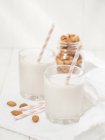 Almond milk in glasses — Stock Photo