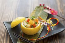 Salt yogurt kuai with colorful vegetables on black plate — Stock Photo