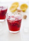 Raspberry lemonade with ice cubes — Stock Photo