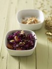 Red cabbage with oranges — Stock Photo