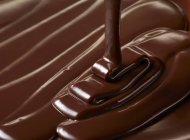 Chocolate negro derretido - foto de stock
