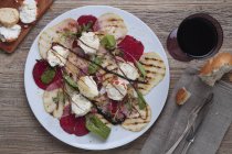 Beetroot carpaccio with fruit — Stock Photo