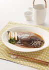 Closeup view of flounder fish simmered in soy sauce — Stock Photo