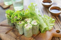 Salad roll with pork and sauces — Stock Photo