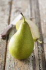 Fresh whole and halved pears — Stock Photo