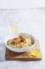 Salmon skewers on spicy rice — Stock Photo