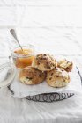 Scones with peach soup — Stock Photo