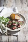 Saltimbocca with duck breast and sage — Stock Photo