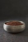 Bowl of red quinoa — Stock Photo