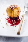 Baked apple with nuts — Stock Photo