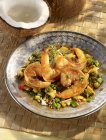 Fried prawns with vegetables and coconut — Stock Photo
