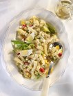Fusili pasta salad with eggs and diced vegetables — Stock Photo