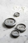 Closeup view of weights on a floured marble surface — Stock Photo
