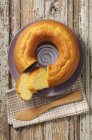 Closeup top view of cut rum Baba on plate — Stock Photo