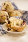Bilberry muffins on dish — Stock Photo