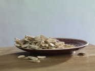 Plate of sunflower seeds — Stock Photo
