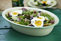 Salads Nioise with olives and eggs — Stock Photo