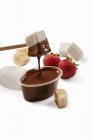 Chocolate fondue with marshmallows — Stock Photo