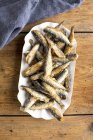Plate of fried smelt fish — Stock Photo