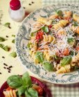 Fusili pasta with tomatoes — Stock Photo