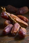Fresh Dates with sprig — Stock Photo