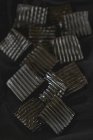 Bonbons de réglisse côtelés carrés noirs — Photo de stock