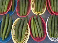 Cucumbers in plastic baskets — Stock Photo