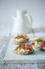 Crostini topped with cheese — Stock Photo
