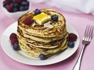 Stack of pancakes with butter — Stock Photo