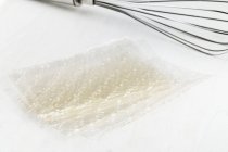 Sheets of gelatine on  board — Stock Photo