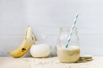 Banana smoothie with seeds — Stock Photo