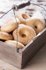 Bagels in wooden crate — Stock Photo
