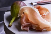 Parma ham and fresh fig — Stock Photo