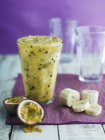 Banana smoothie in glass — Stock Photo