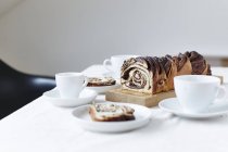 Closeup view of cut roll with chocolate filling — Stock Photo