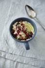 Muesli with coconut, cranberries and puffed amaranth — Stock Photo
