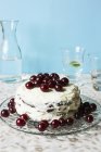 Creamy cake with cherries — Stock Photo