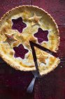 Raspberry pie with pastry stars — Stock Photo