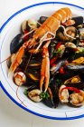 Mixed mussels with scampi — Stock Photo