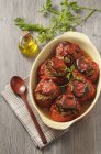 Stuffed tomatoes in tin — Stock Photo