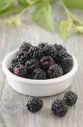 Blackberries in small bowl — Stock Photo
