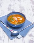 Closeup view of fish stew with prawns in bowl — Stock Photo