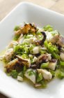 Squid with green peppers — Stock Photo